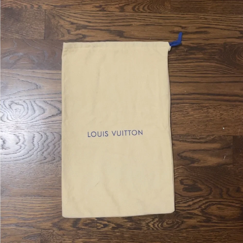Louis Vuitton Cream Bag with Blue Logo